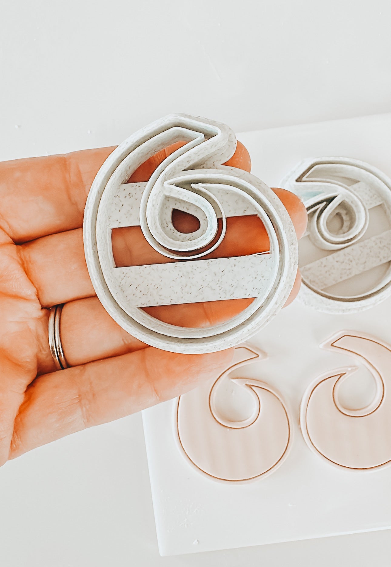Mirrored Curl Wit Border Clay Cutter 2 inches