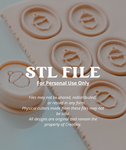 A promotional graphic for a digital STL file cutting mold set. The image shows a round 3D printed stamp with an acorn design, with several stamped acorn impressions visible on a light surface in the background, with a dark translucent overlay containing the text &