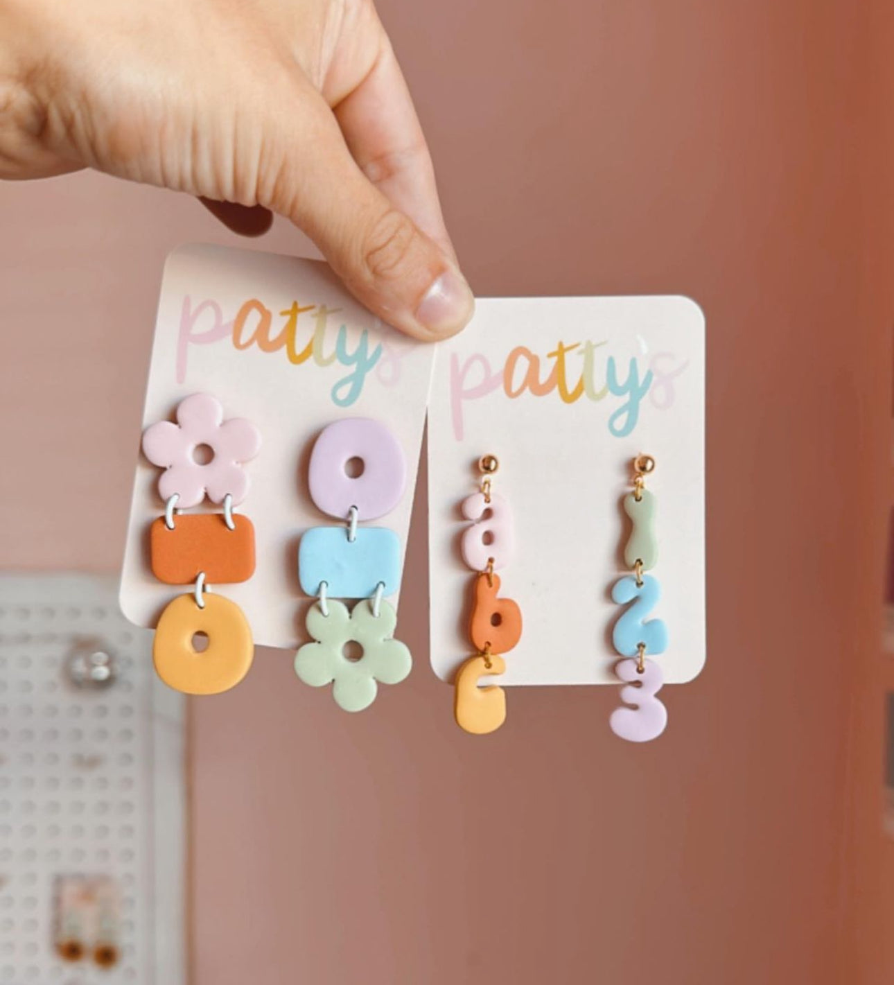 Example of a pair of polymer clay earrings finished by an artist.